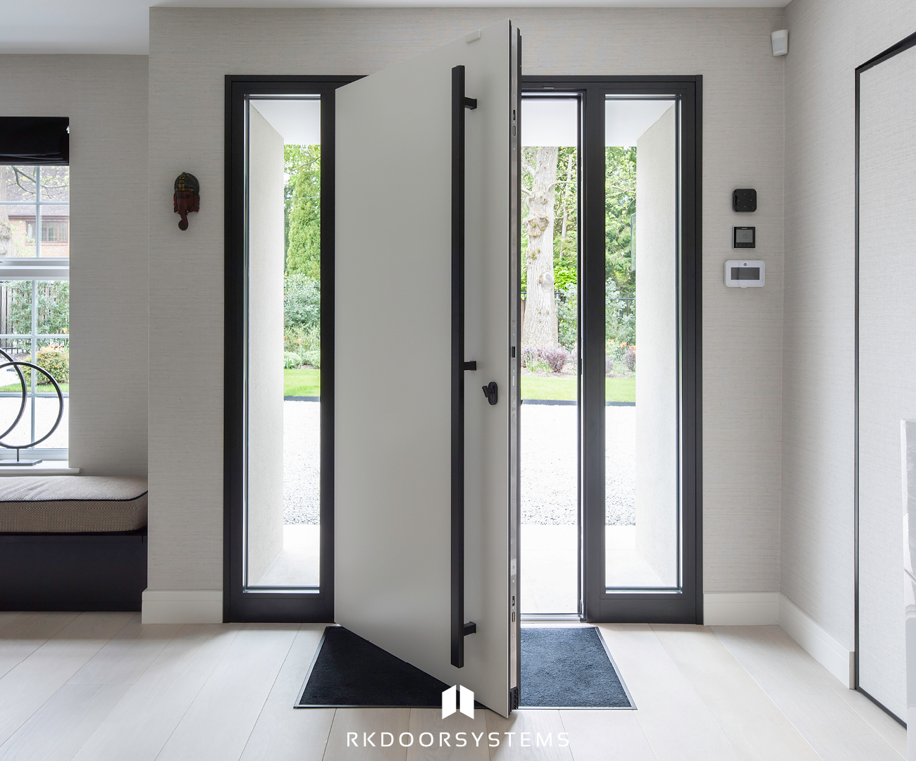 Interior view of pivot entrance door from the hallway