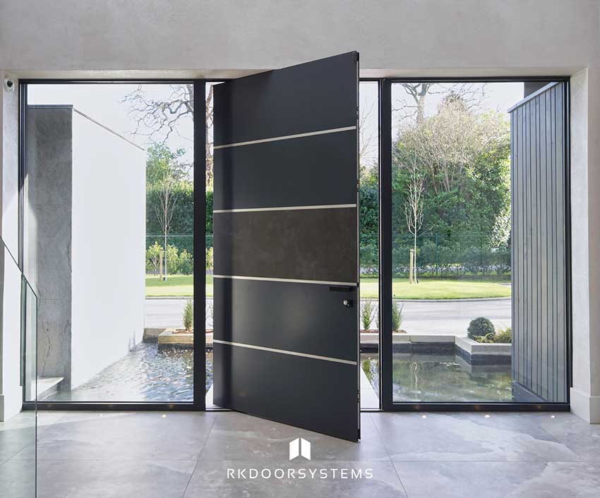 Internal sightline of an XL pivot door from an open-plan living space