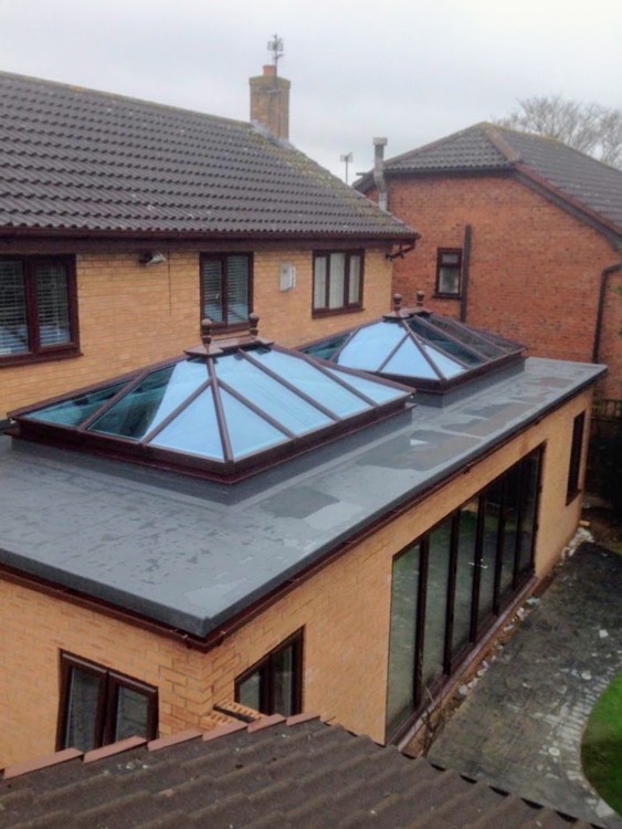 Glazed roof lantern flooding a rear extension with natural light