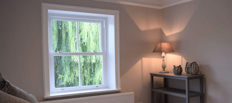 Traditional sliding sash window viewed from a heritage interior