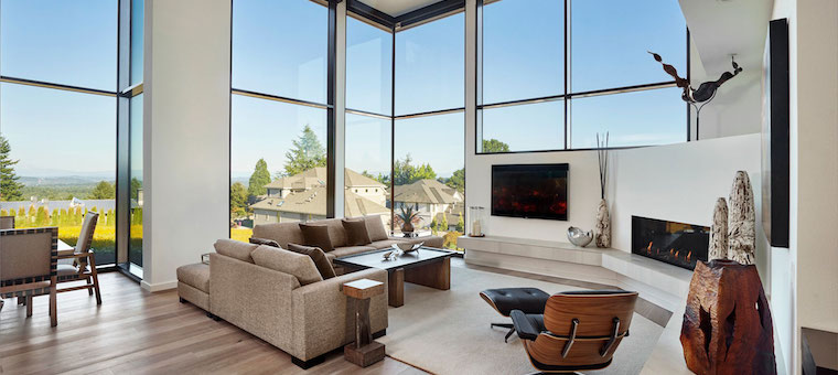 Reynaers CW 50 floor-to-ceiling structural glazing in a contemporary residence