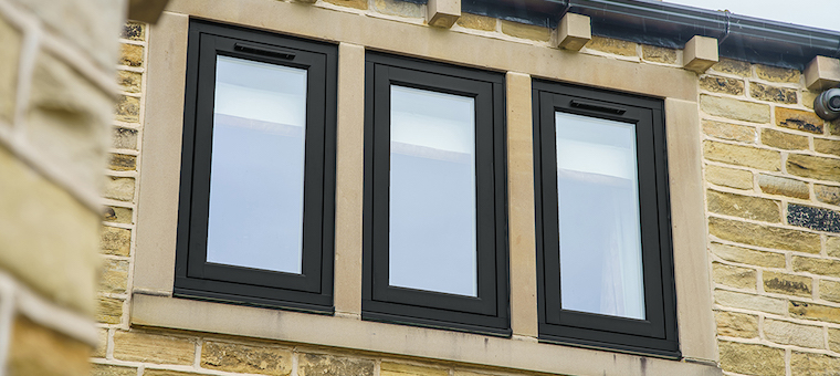 Premium UPVC flush casement windows in noir on a Yorkshire stone property